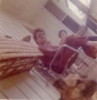 Stoker, Billy and Bubba smoking morning joints on front porch of villa.