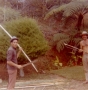 Billy and Burbano splitting bamboo.